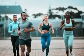 image of man and 3 women doing cardio exercise Bagshot to help tone and remove fat from the body.